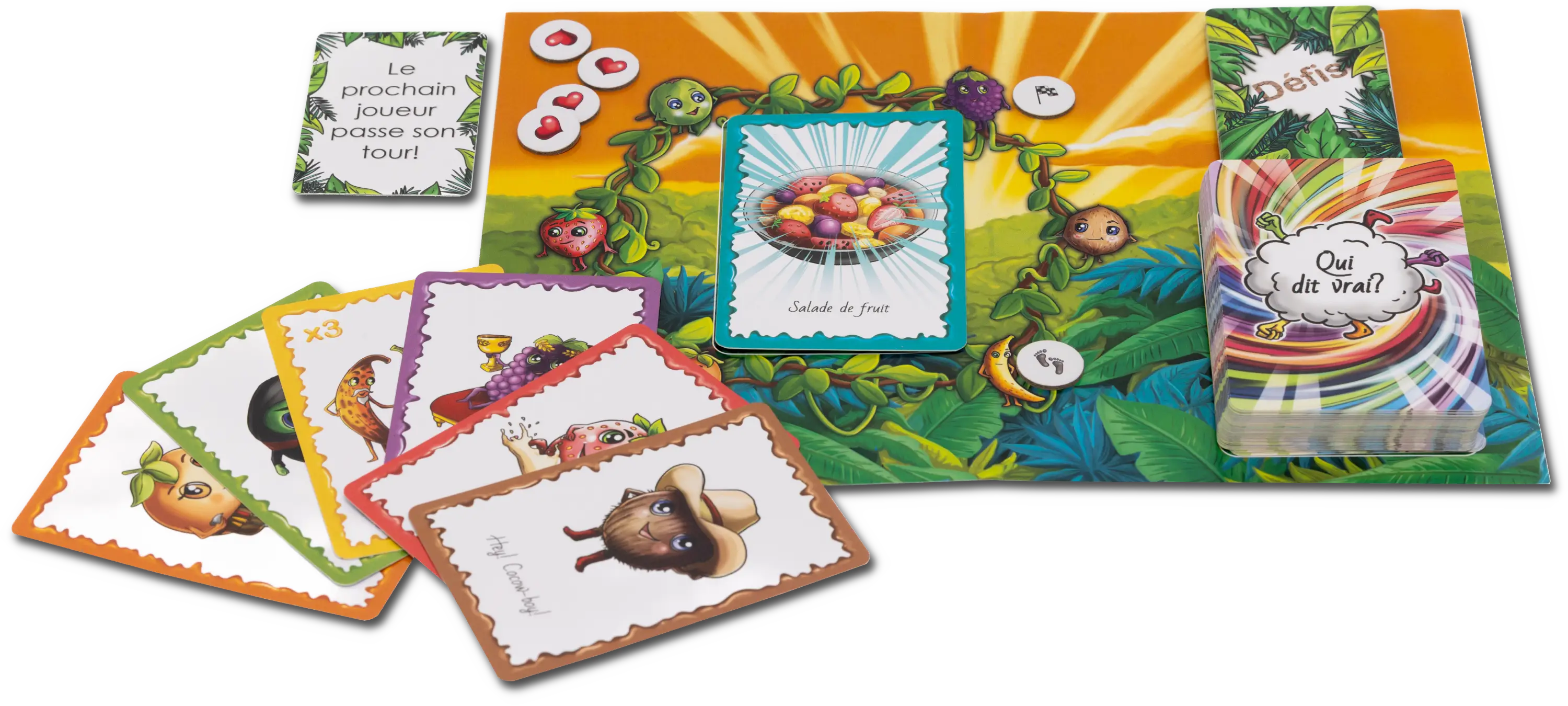 Plateau de jeu, cartes fruit, cartes défis et pions du jeu de société familial « Qui dit vrai ? » – bluff et stratégie dès 7 ans